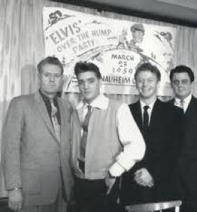 BIO Elvs with Vernon and Red West under Elvis Presley youth banner